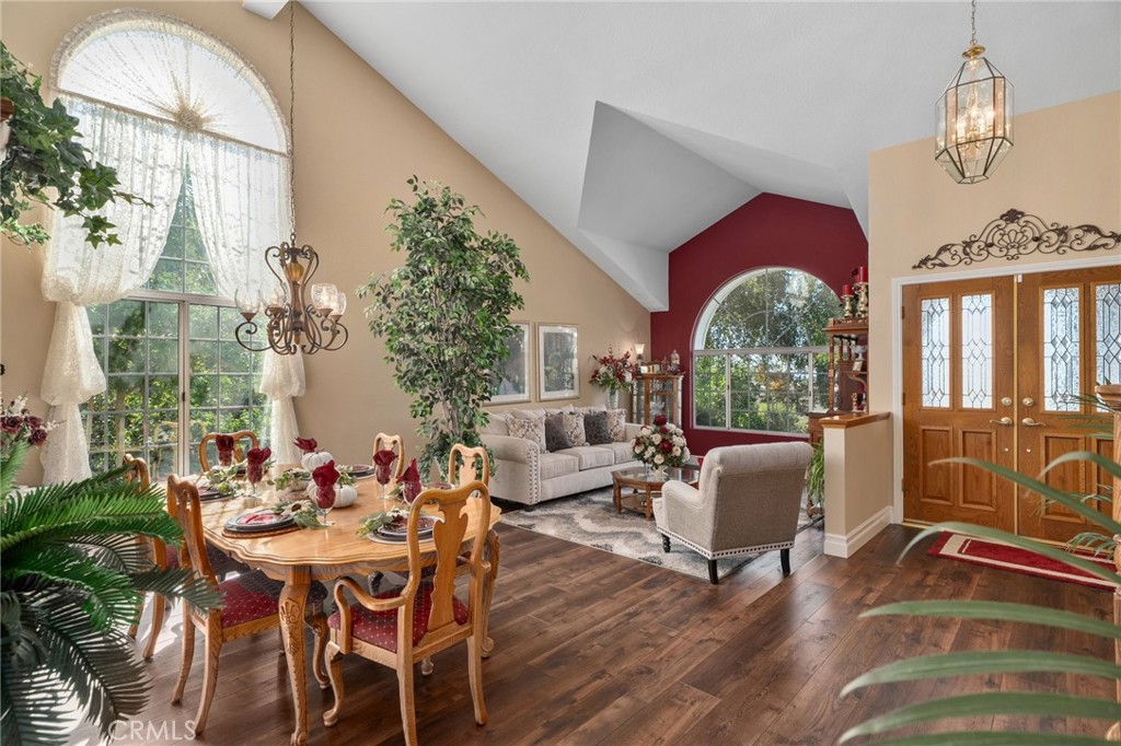 10684 Lakeview Road Yucaipa, CA 92399 - Photo 12 of 63 a view of a dining room with furniture window and wooden floor