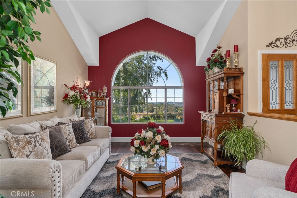 10684 Lakeview Road Yucaipa, CA 92399 - Photo 13 of 63 a living room with furniture and a large window