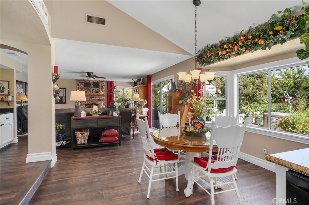 10684 Lakeview Road Yucaipa, CA 92399 - Photo 23 of 63 a view of a dining room with furniture window and outside view