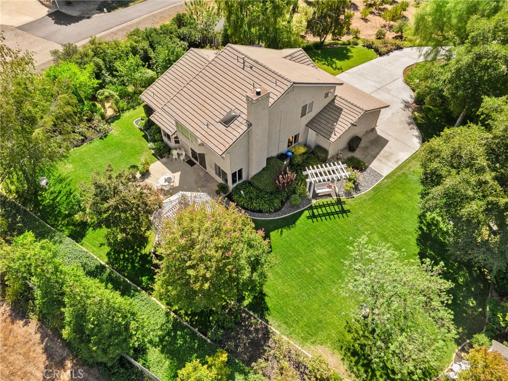 10684 Lakeview Road Yucaipa, CA 92399 - Photo 60 of 63 an aerial view of a house with garden space and street view