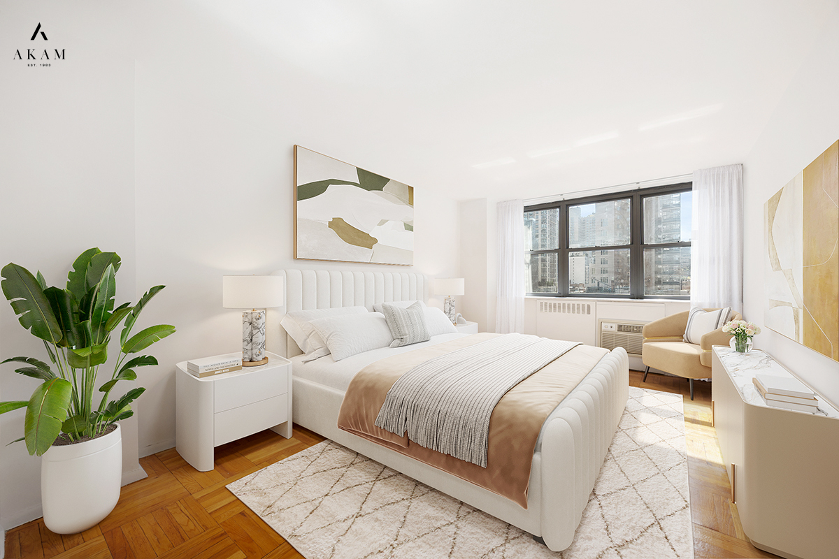 239 East 79th Street, Unit 8A Manhattan, NY 10075 - Photo 8 of 14 a bedroom with a bed and a couch