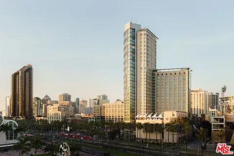 a view of a city with tall buildings