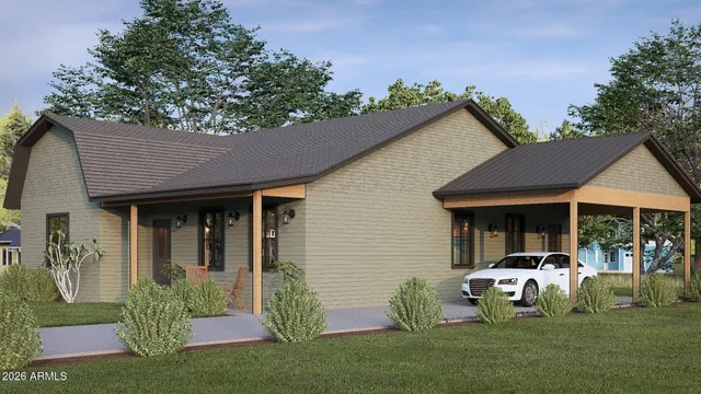 a front view of a house with garden