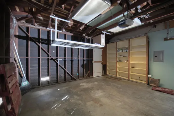 a porch area with a glass door