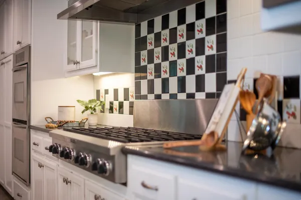 an aerial view of residential house with outdoor space and parking