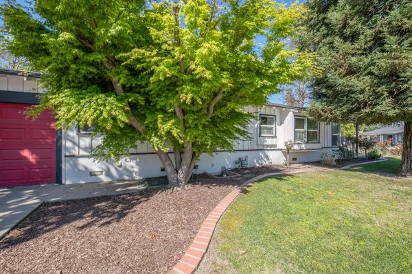 a view of a house with swimming pool
