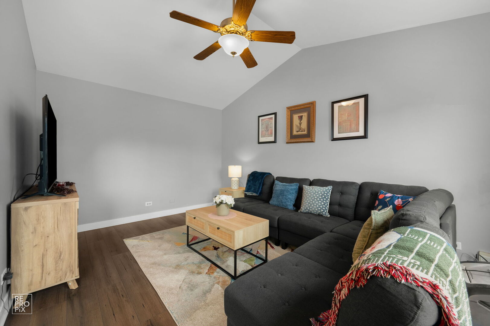 95 North Southport Road Mundelein, IL 60060 - Photo 13 of 26 a living room with furniture and a flat screen tv