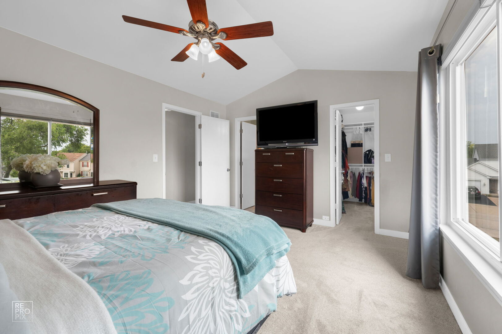 95 North Southport Road Mundelein, IL 60060 - Photo 17 of 26 a bedroom with a bed and a flat screen tv