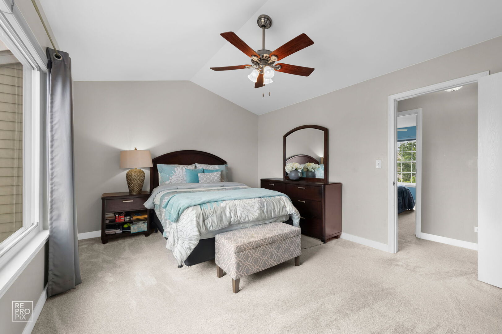 95 North Southport Road Mundelein, IL 60060 - Photo 18 of 26 a bedroom with a bed and a window