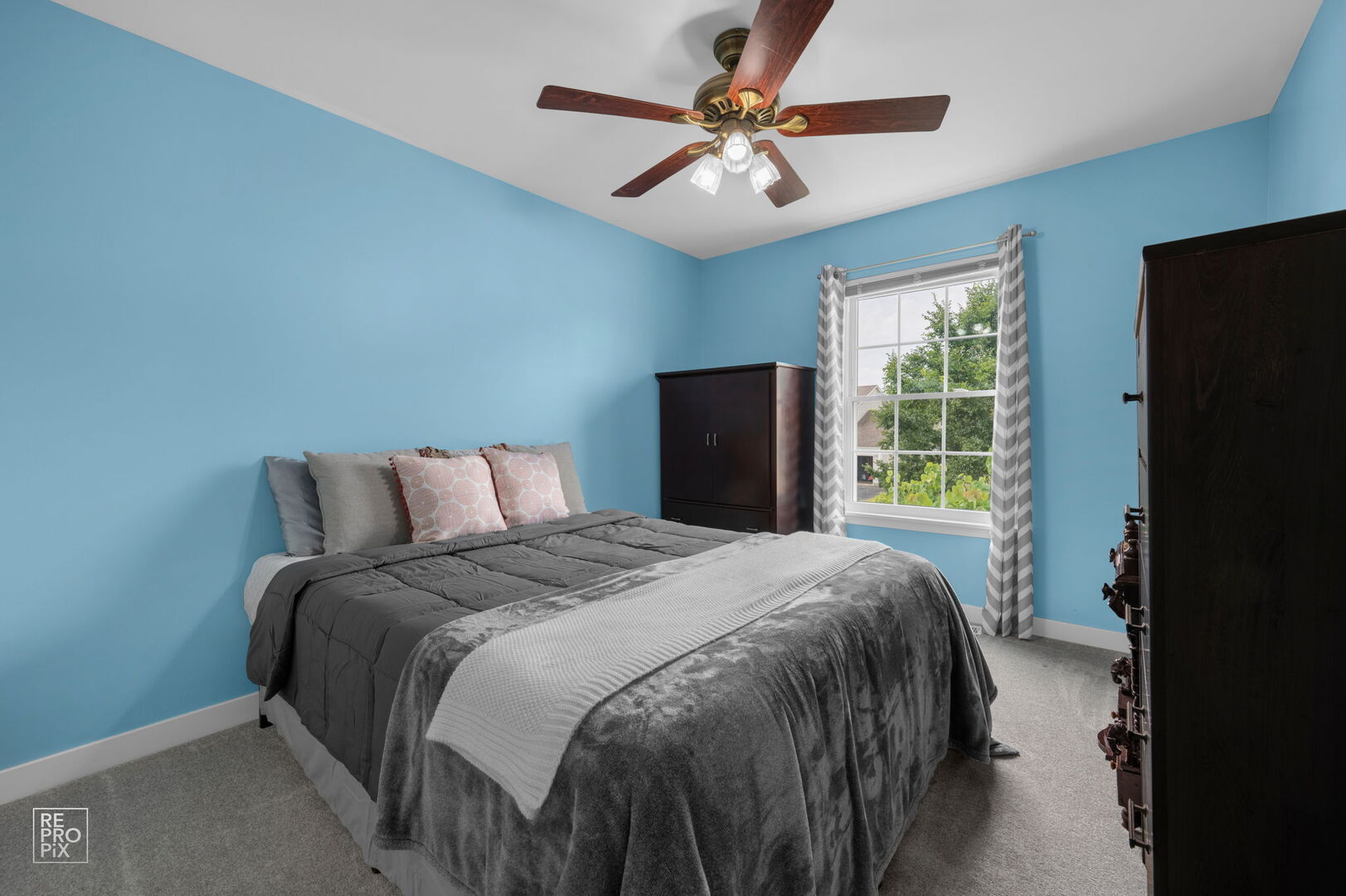 95 North Southport Road Mundelein, IL 60060 - Photo 23 of 26 a bedroom with a bed and a large window