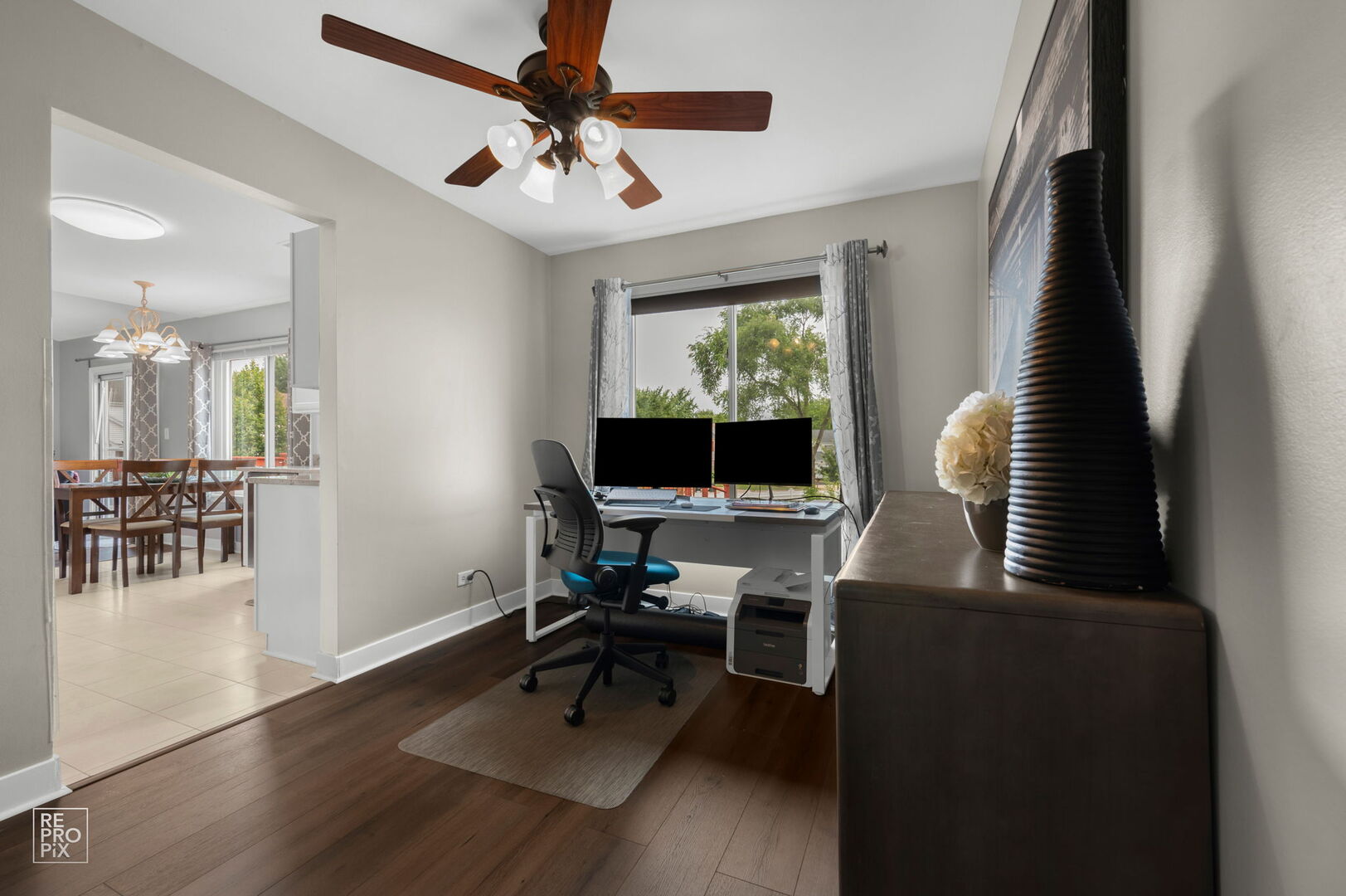 95 North Southport Road Mundelein, IL 60060 - Photo 7 of 26 a workspace with wooden floor and a window