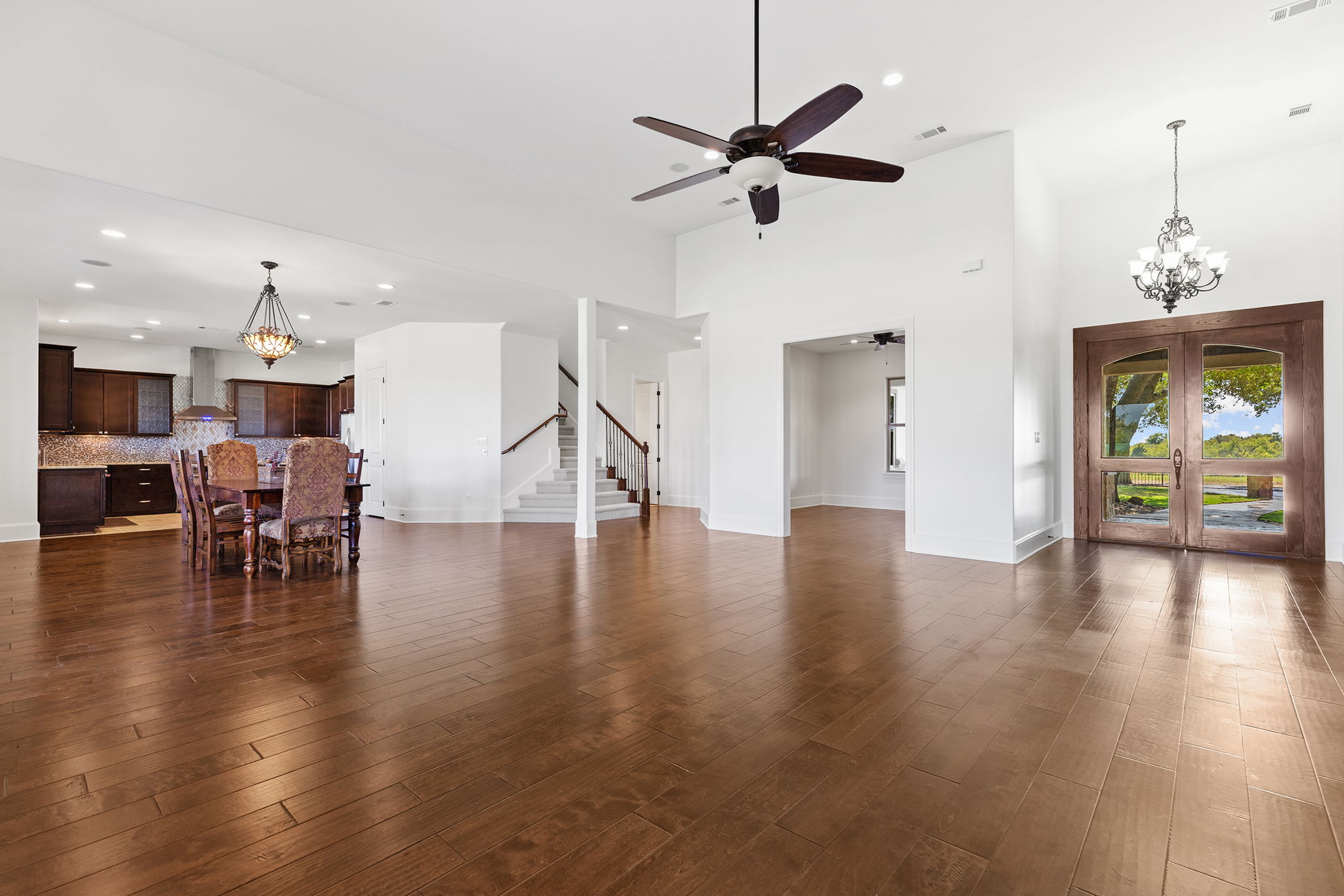 1124 County Road 301 Elgin, TX 78621 - Photo 12 of 40 a view of a dining room with furniture and wooden floor