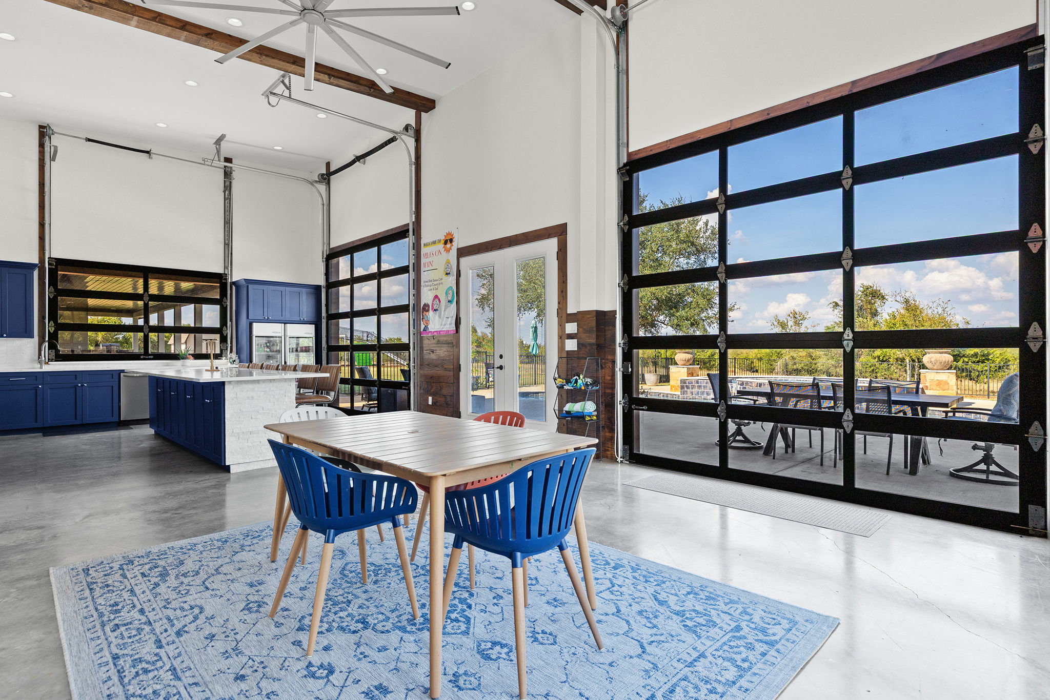 1124 County Road 301 Elgin, TX 78621 - Photo 33 of 40 a dining area with a table and chairs