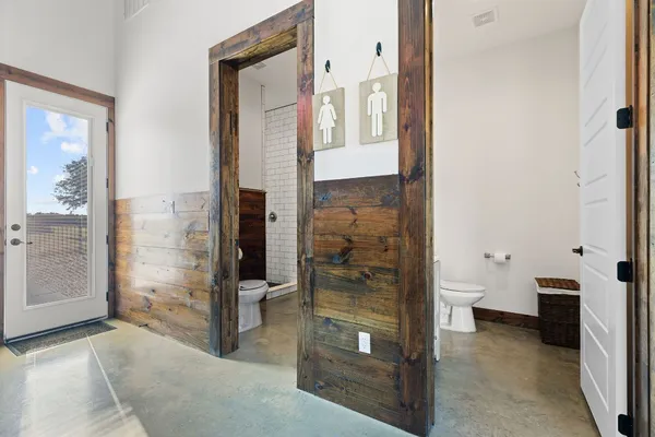 a view of a bathroom with a glass door