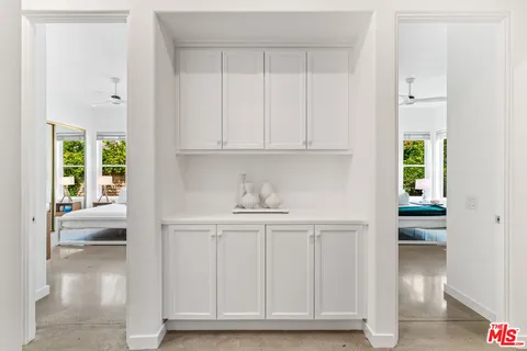 a view of cabinets and window