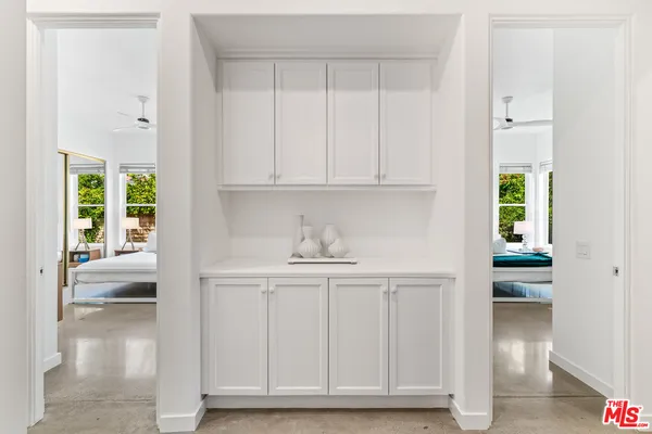a view of cabinets and window