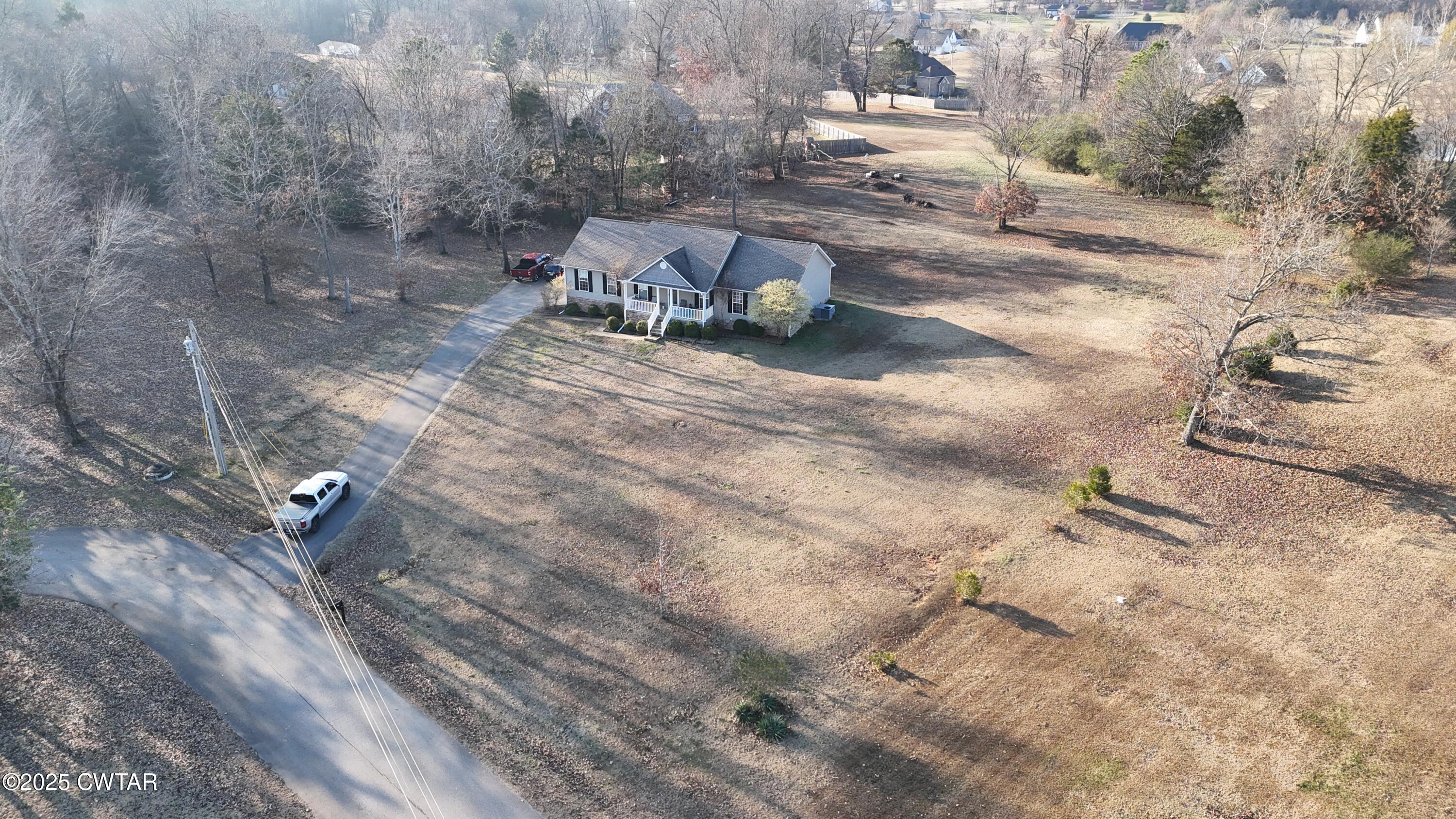 759 Timber Ridge Drive Lexington, TN 38351 - Photo 18 of 18 a view of a backyard of the house