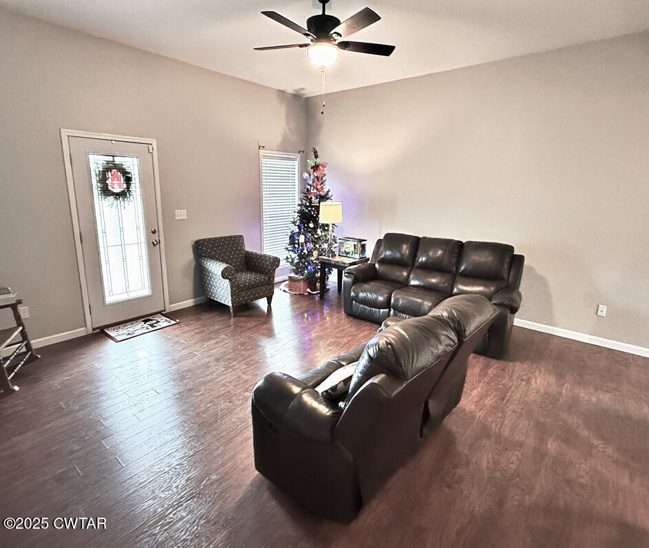 759 Timber Ridge Drive Lexington, TN 38351 - Photo 9 of 18 a living room with furniture and wooden floor