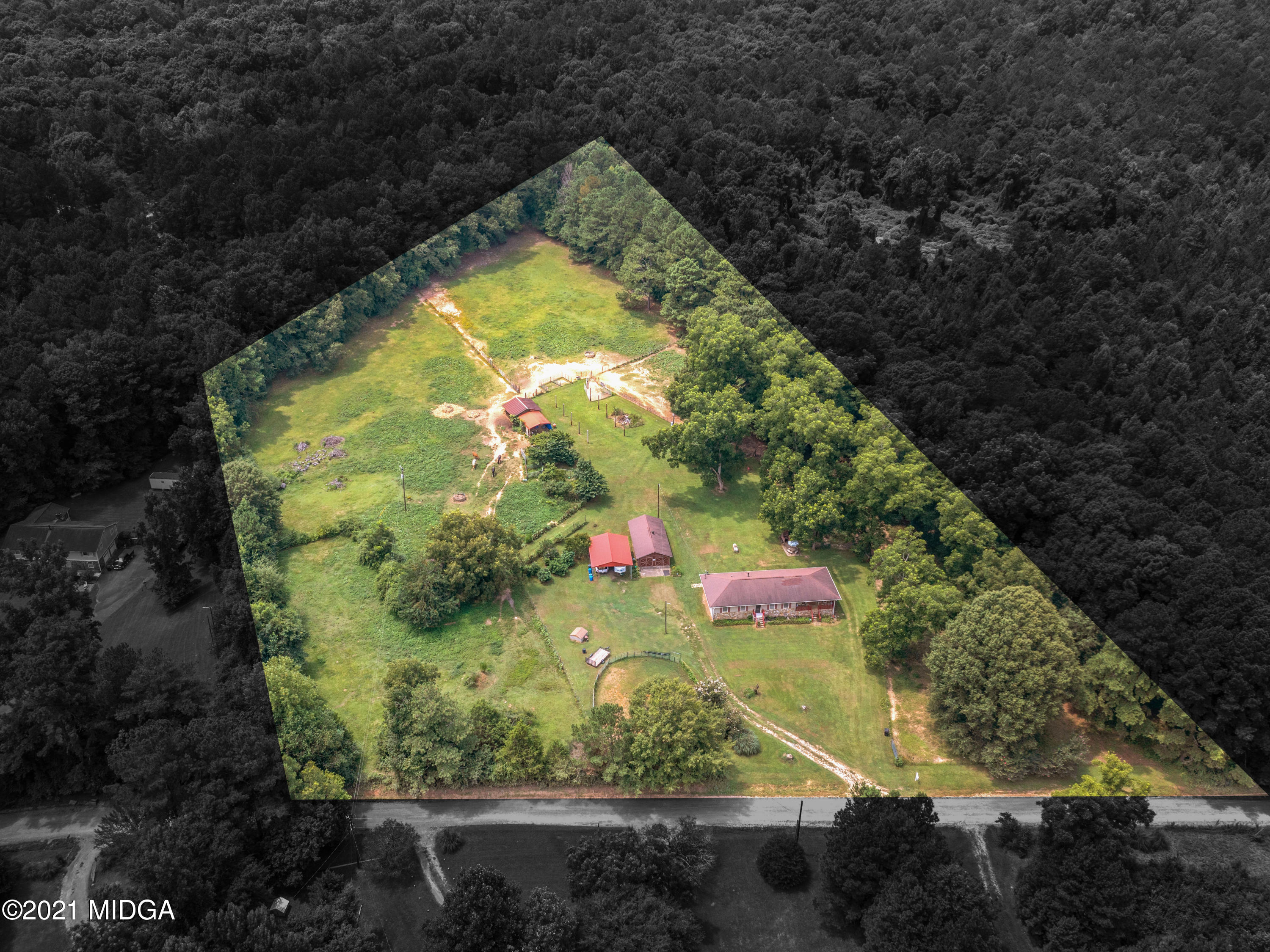747 Chuli Road Griffin, GA 30223 - Photo 2 of 45 a view of a garden