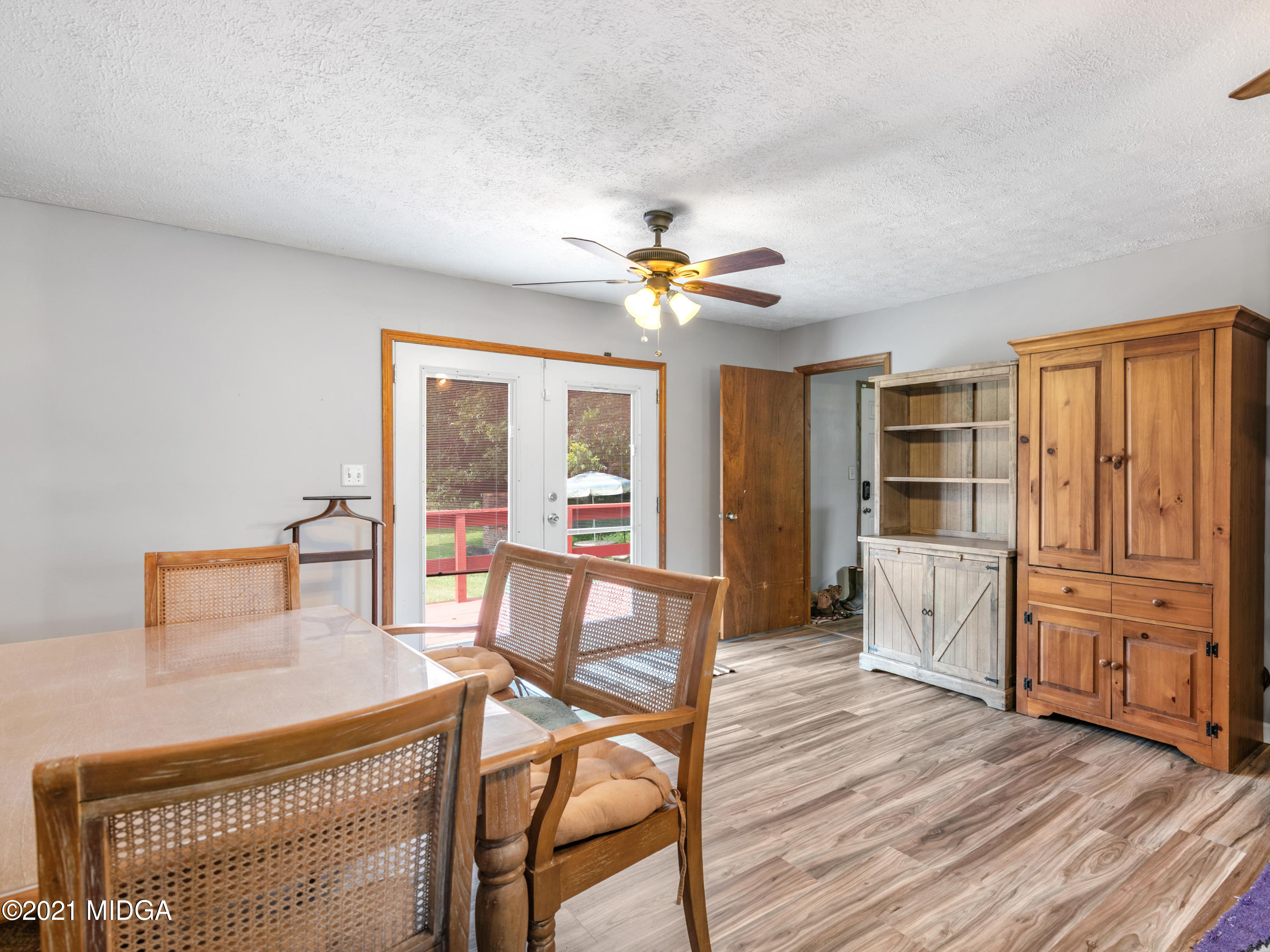 747 Chuli Road Griffin, GA 30223 - Photo 11 of 45 a view of a livingroom with furniture and a ceiling fan