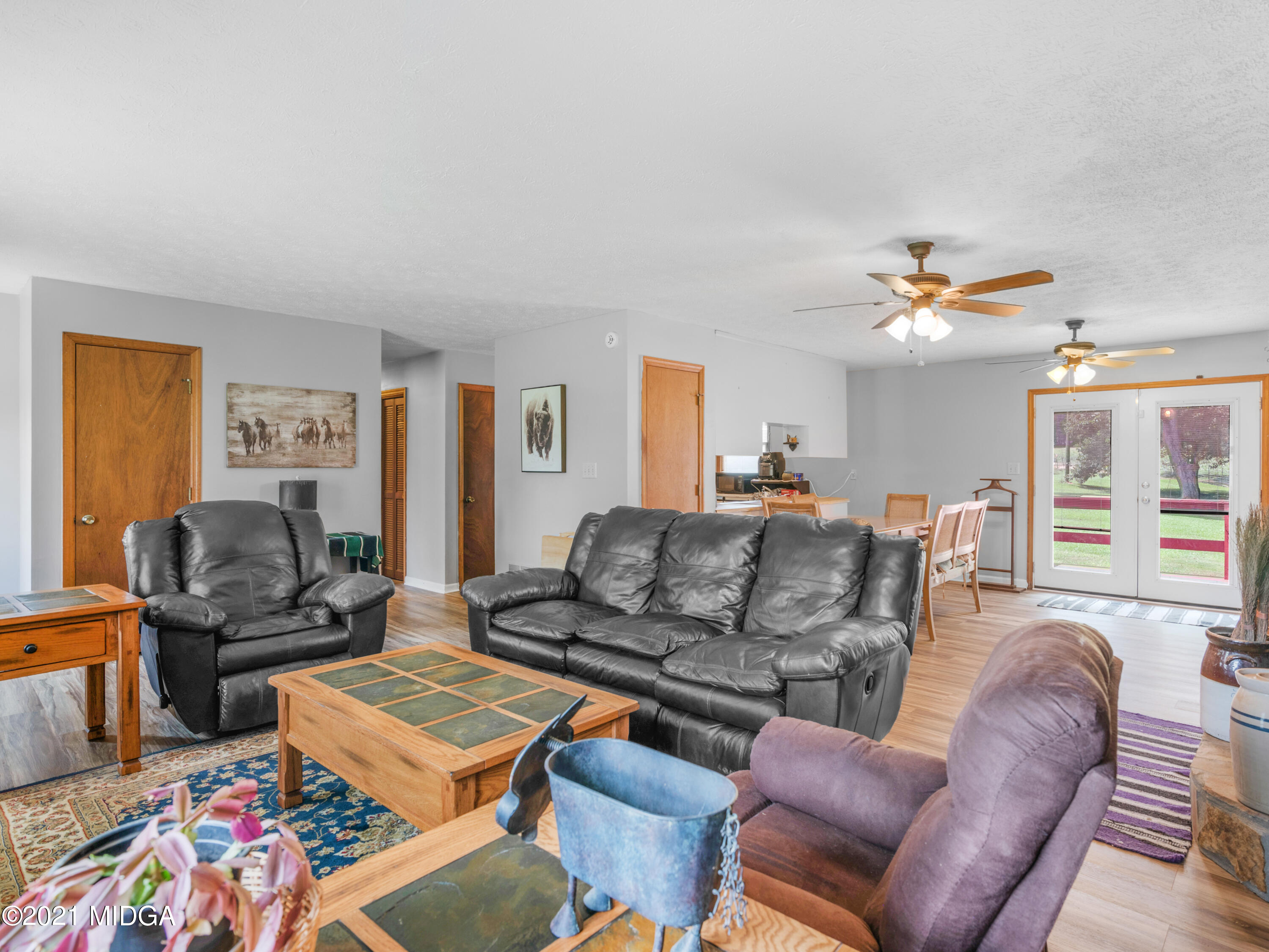 747 Chuli Road Griffin, GA 30223 - Photo 16 of 45 a living room with furniture and a couch