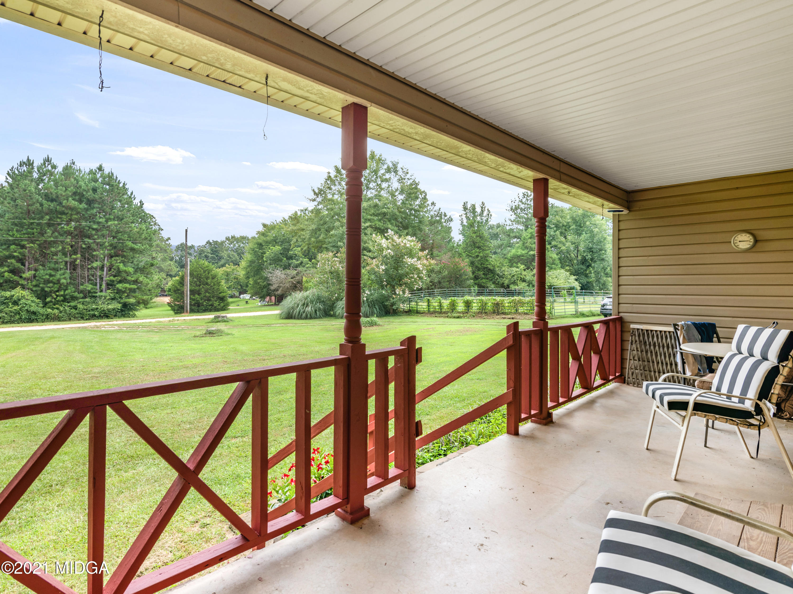 747 Chuli Road Griffin, GA 30223 - Photo 36 of 45 a view of deck with furniture and garden