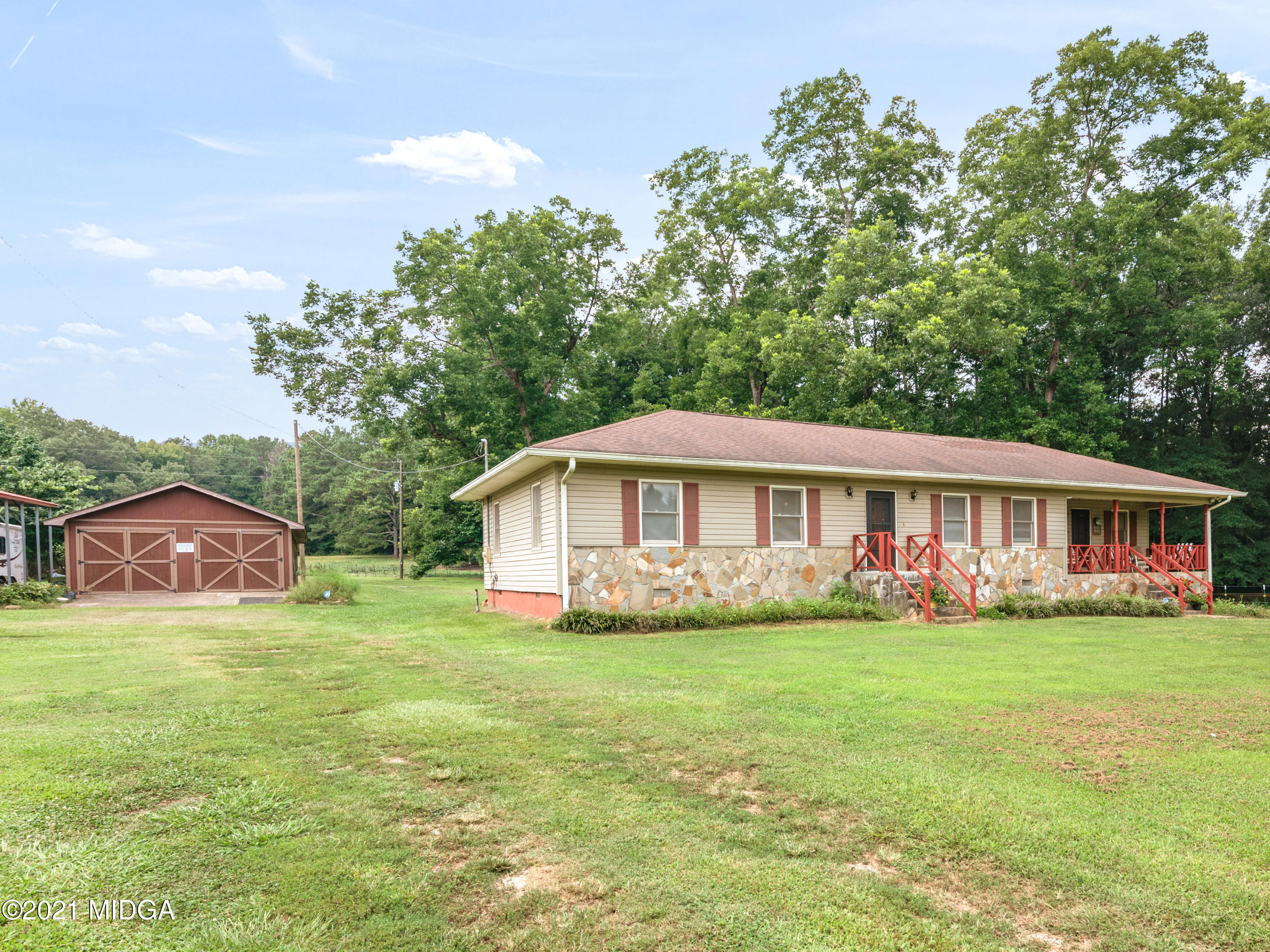 747 Chuli Road Griffin, GA 30223 - Photo 39 of 45 a view of a house with a yard and sitting area