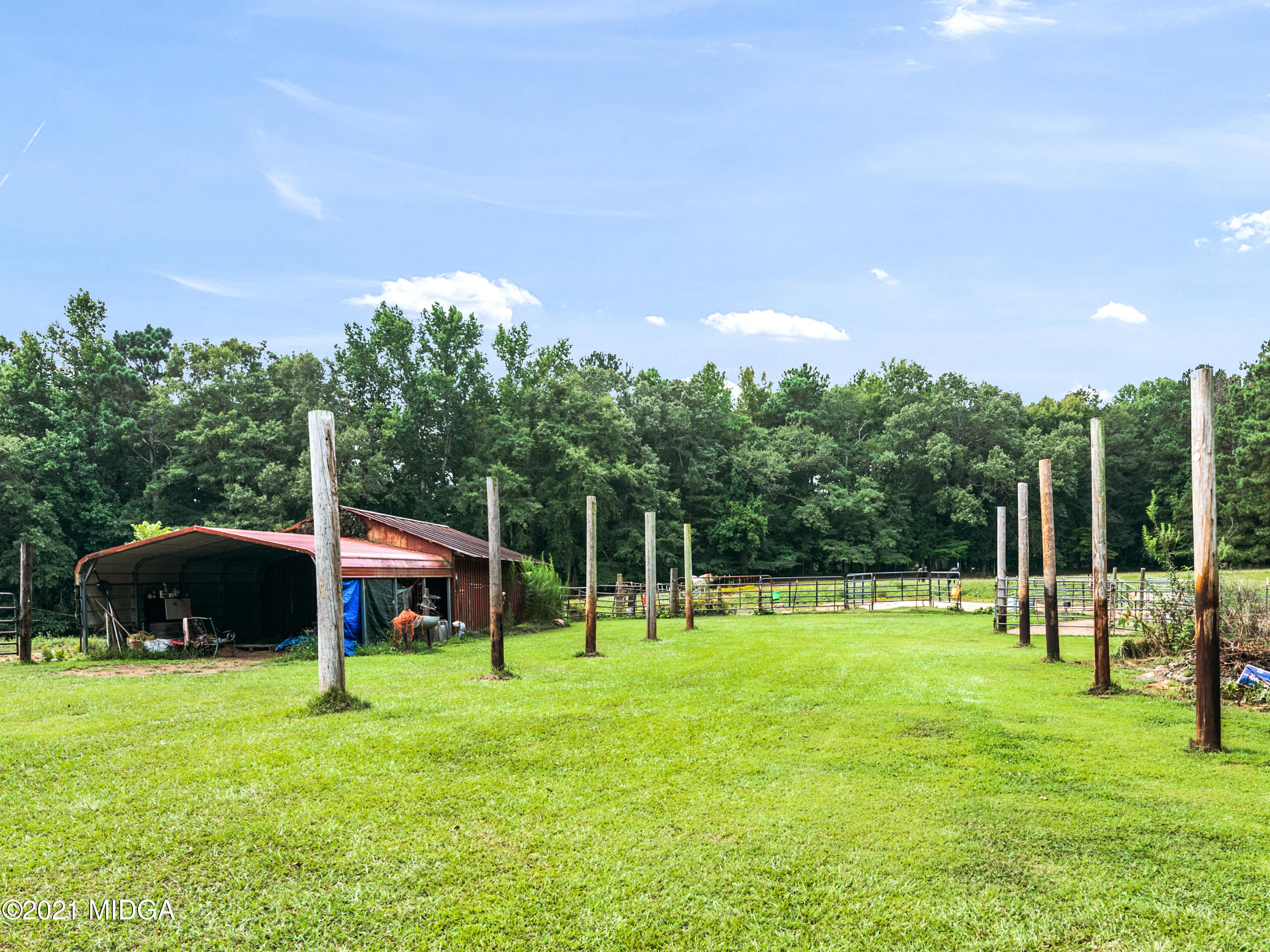 747 Chuli Road Griffin, GA 30223 - Photo 41 of 45 a front view of a house with a yard and trees