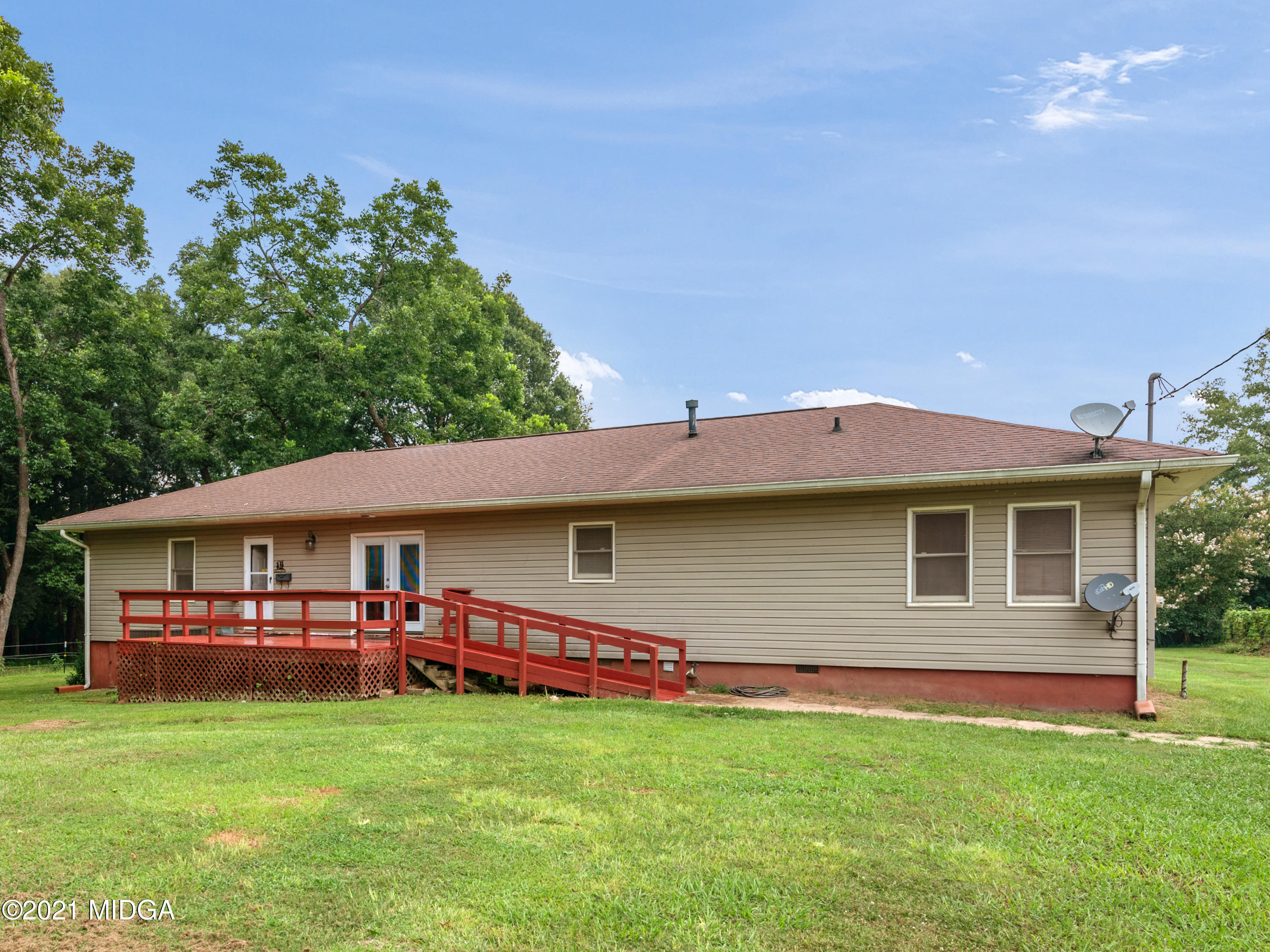747 Chuli Road Griffin, GA 30223 - Photo 45 of 45 a front view of a house with garden