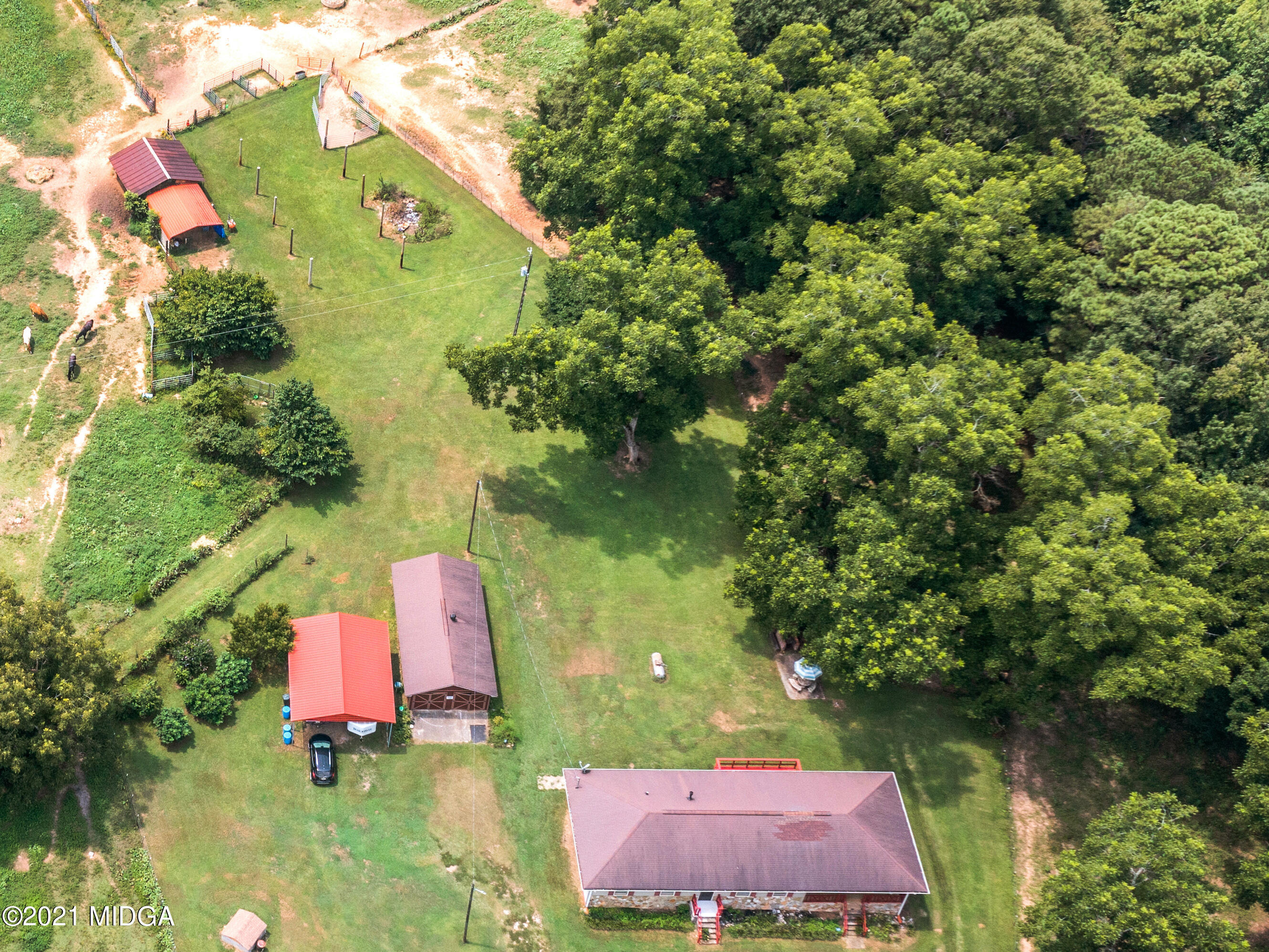747 Chuli Road Griffin, GA 30223 - Photo 6 of 45 an aerial view of residential house with outdoor space and swimming pool