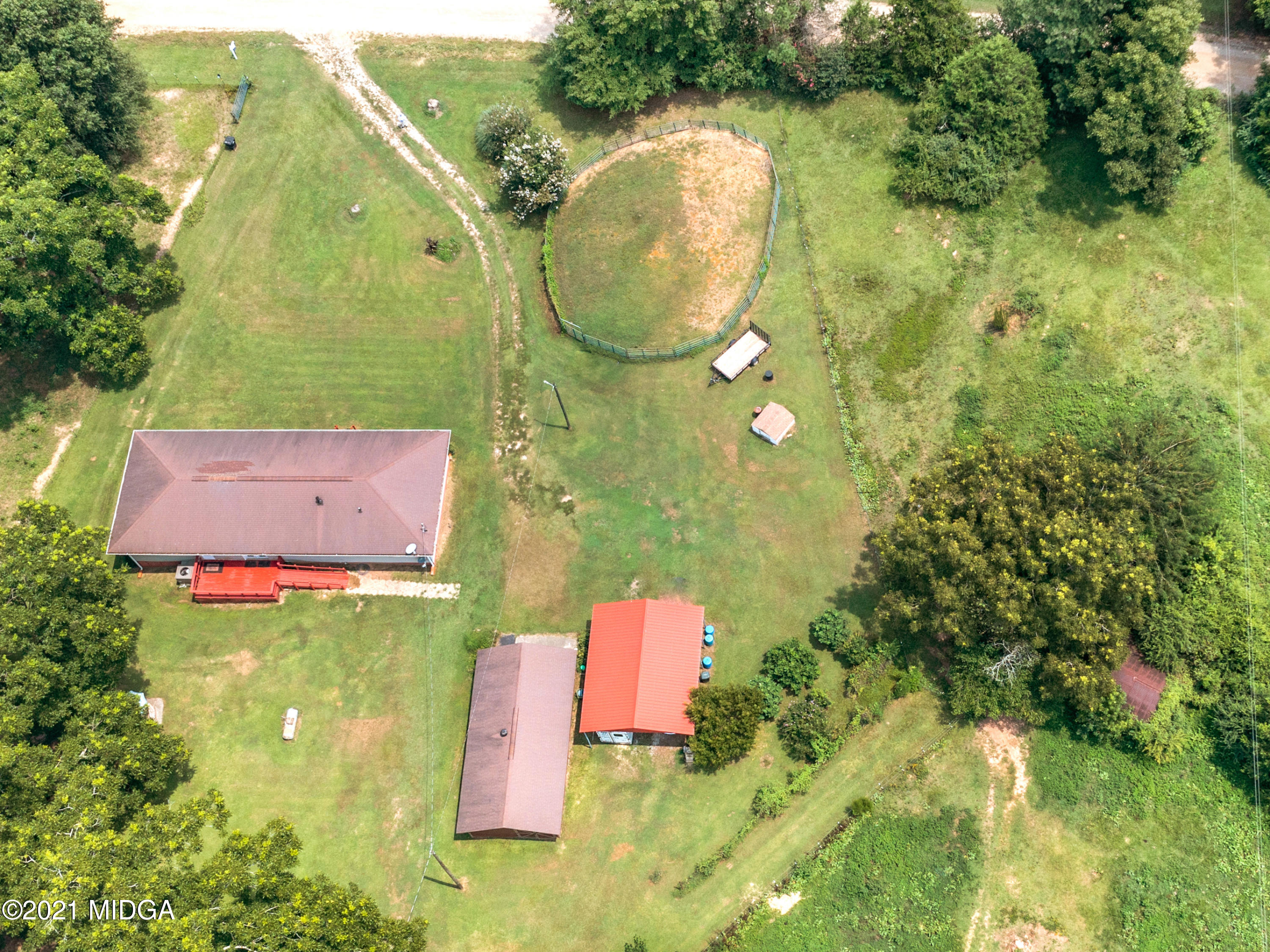 747 Chuli Road Griffin, GA 30223 - Photo 7 of 45 an aerial view of residential house with pool and yard
