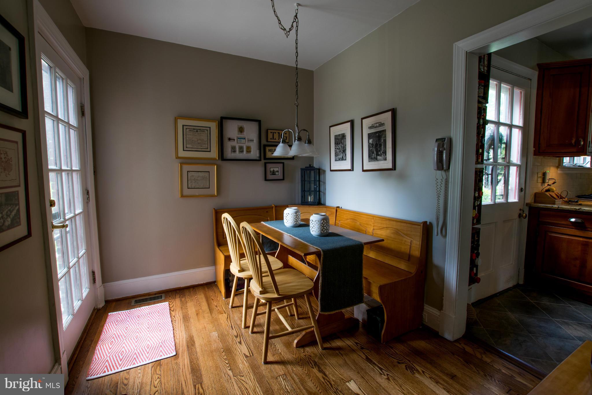122 Midhurst Road Baltimore, MD 21212 - Photo 12 of 21 a view of a dining room with furniture and window