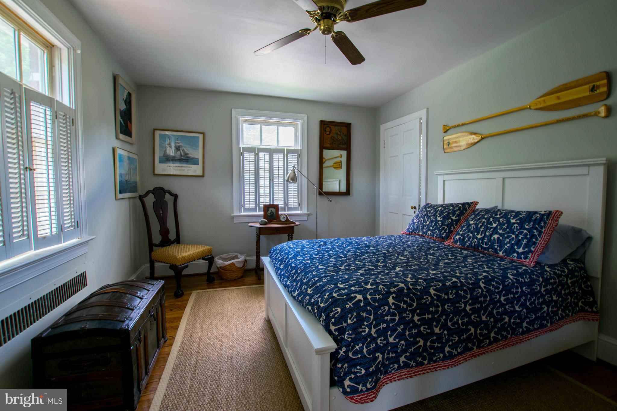 122 Midhurst Road Baltimore, MD 21212 - Photo 15 of 21 a bed room with a bed and window