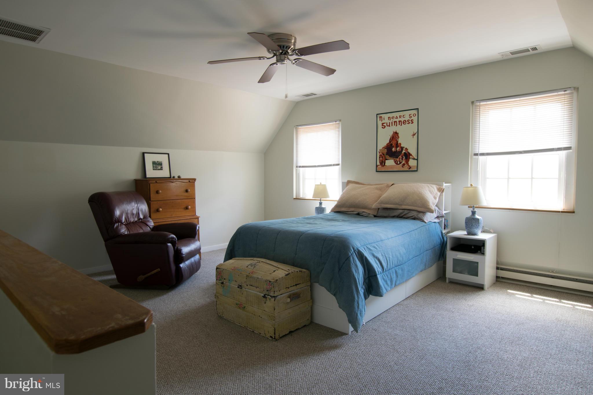 122 Midhurst Road Baltimore, MD 21212 - Photo 21 of 21 a bedroom with a bed and window