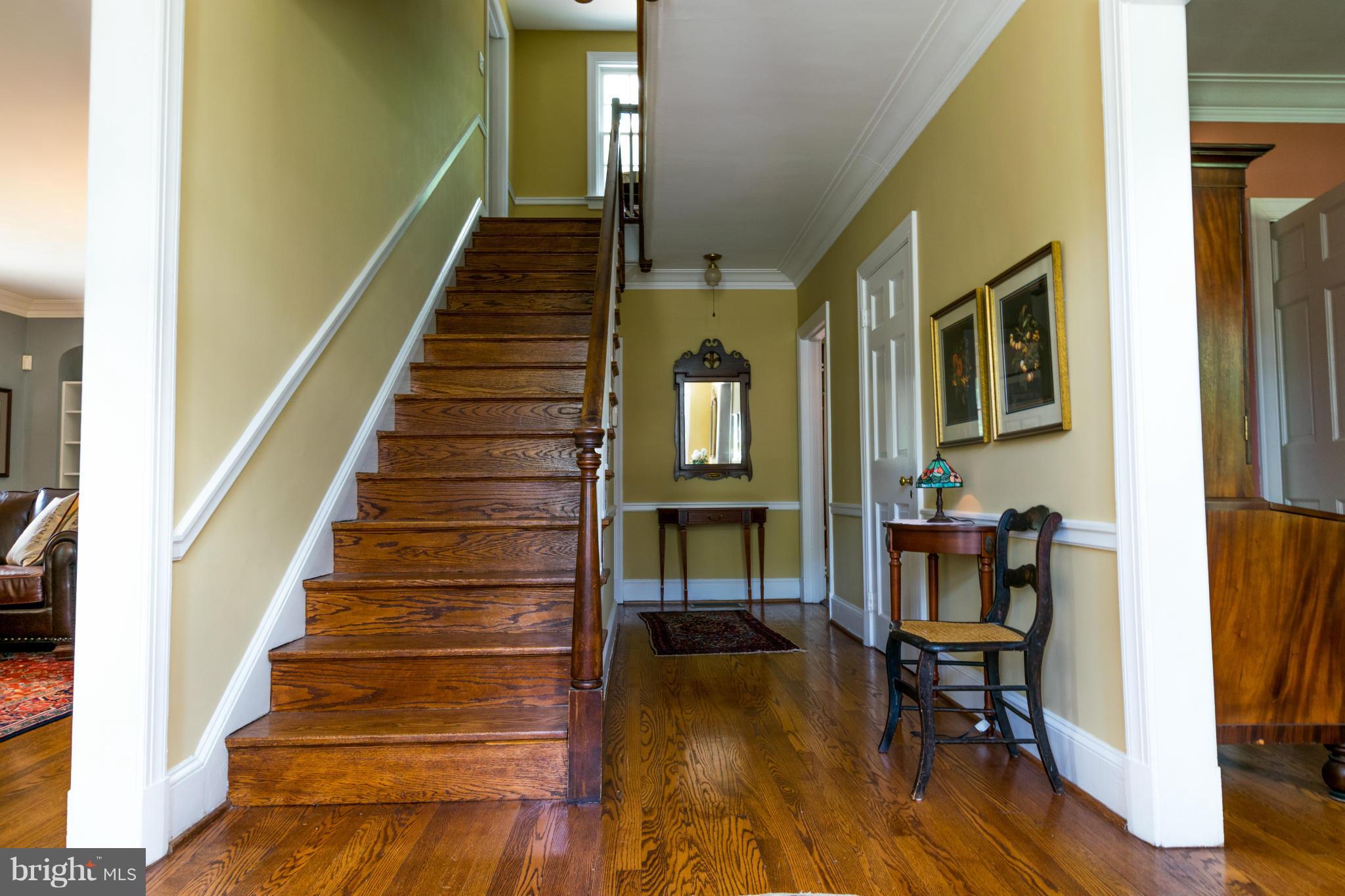 122 Midhurst Road Baltimore, MD 21212 - Photo 6 of 21 a view of entryway and hall with wooden floor