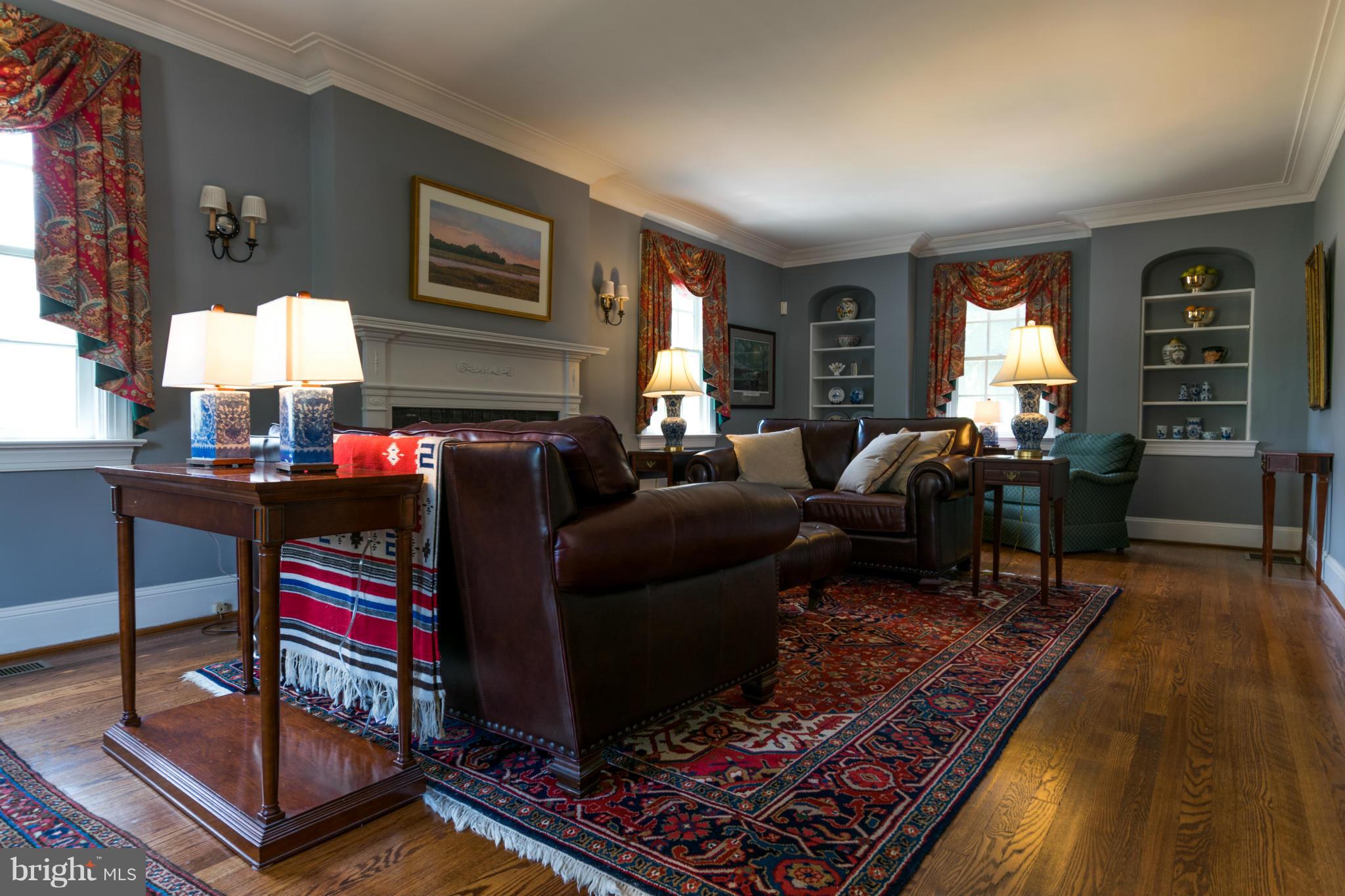122 Midhurst Road Baltimore, MD 21212 - Photo 7 of 21 a living room with furniture fireplace and a table