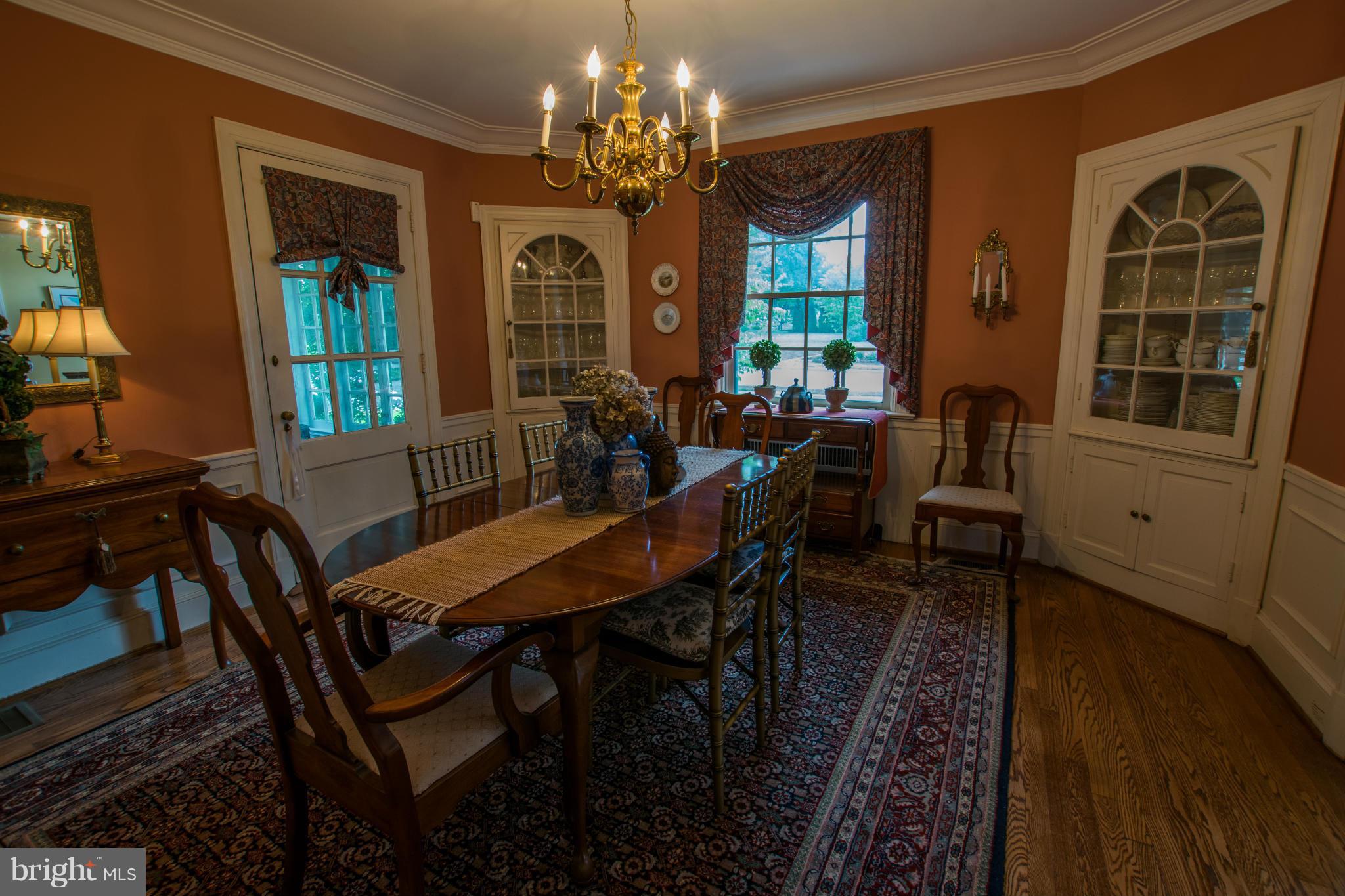 122 Midhurst Road Baltimore, MD 21212 - Photo 8 of 21 a view of a dining room with furniture window and wooden floor