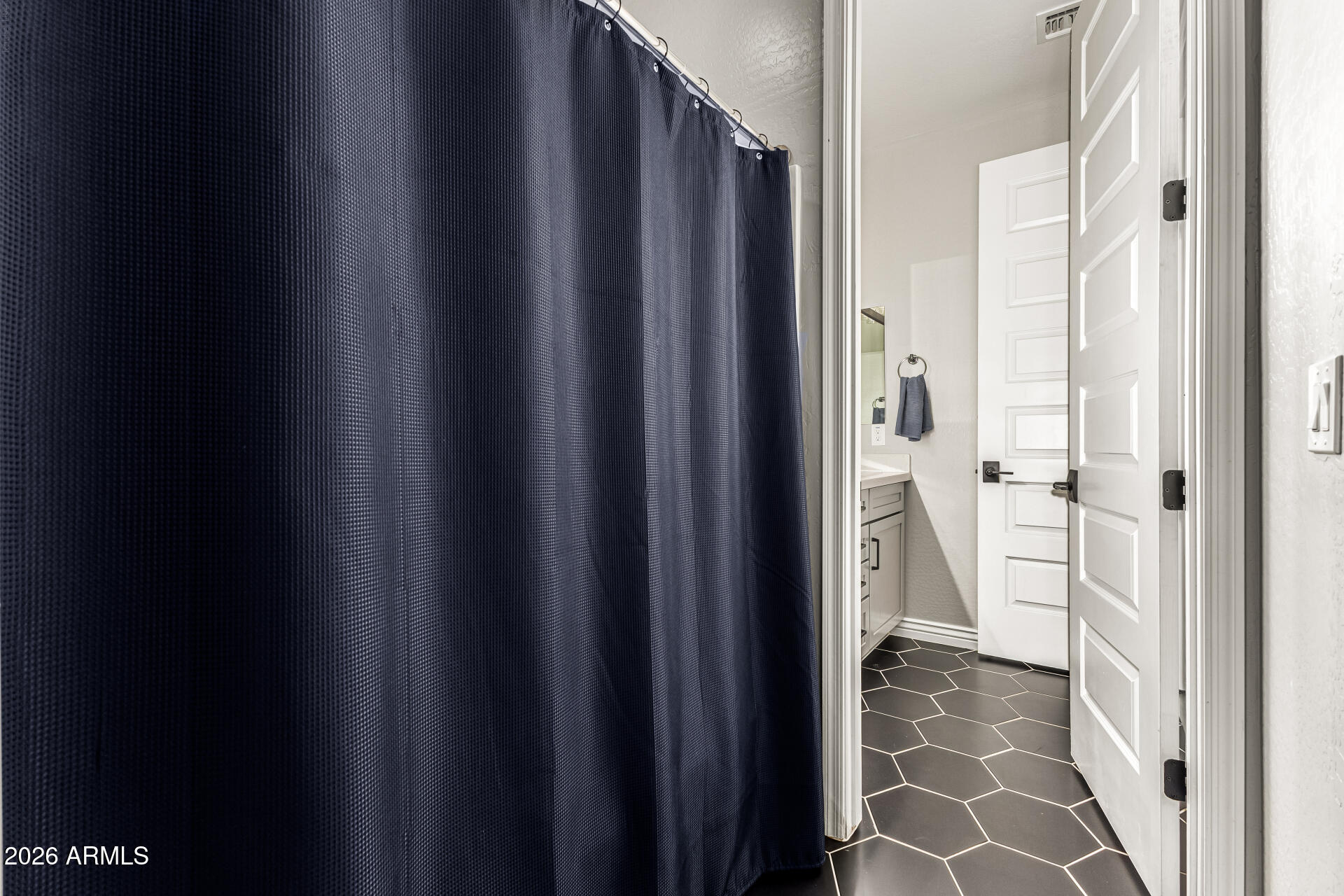 20416 Rosa Road Queen Creek, AZ 85142 - Photo 28 of 51 a view of a bathroom from the hallway