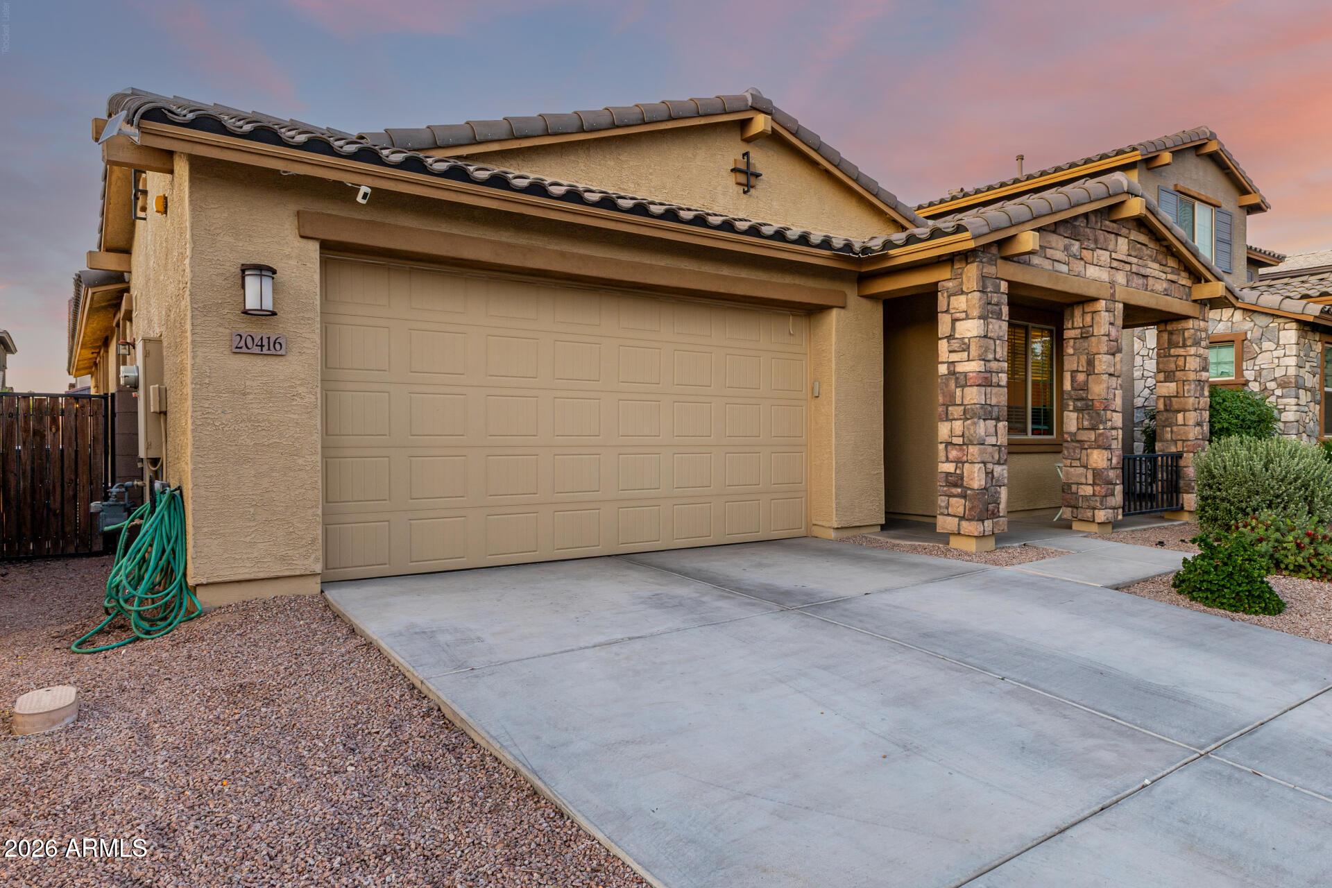 20416 Rosa Road Queen Creek, AZ 85142 - Photo 3 of 51 front view of a house with a garage