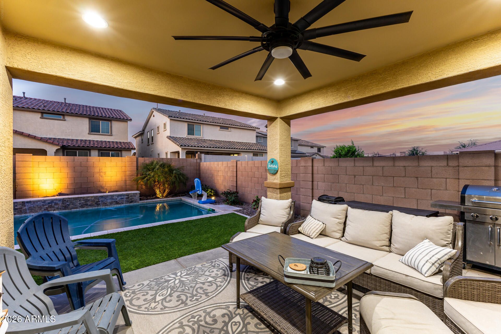 20416 Rosa Road Queen Creek, AZ 85142 - Photo 38 of 51 a outdoor living space with furniture and a flat screen tv