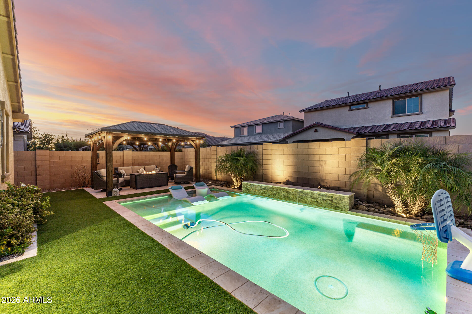 20416 Rosa Road Queen Creek, AZ 85142 - Photo 40 of 51 a view of a swimming pool with a patio