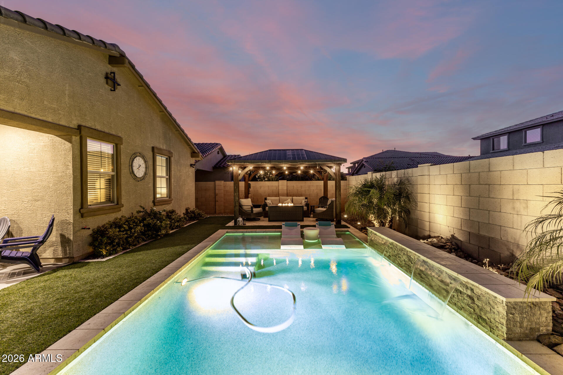 20416 Rosa Road Queen Creek, AZ 85142 - Photo 44 of 51 a view of a swimming pool with a patio and a yard