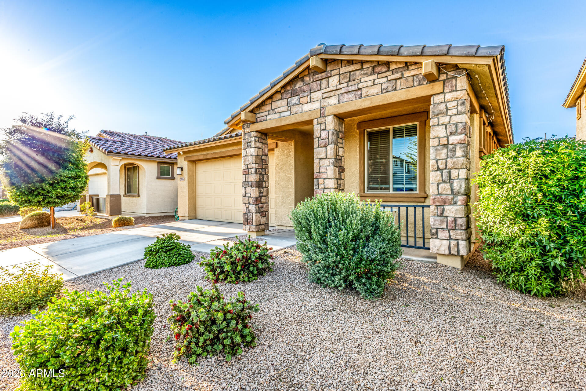 20416 Rosa Road Queen Creek, AZ 85142 - Photo 9 of 51 front view of a house with a yard