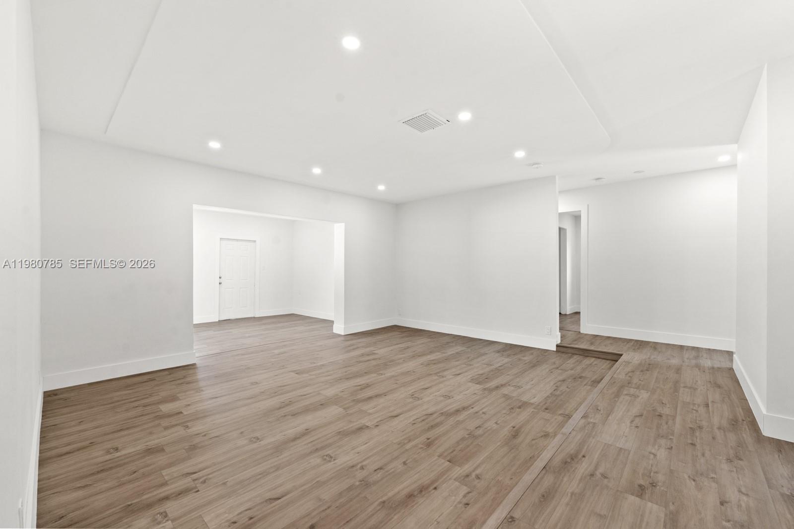 7971 Northwest 3rd Place Margate, FL 33063 - Photo 21 of 41 a view of an empty room with wooden floor