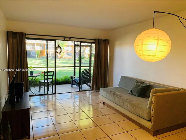 a living room with a couch and a table