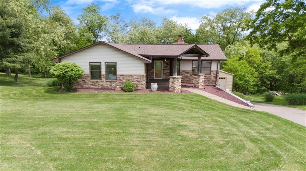 284 McKee Road Washington, PA 15301 - Photo 2 of 35 a front view of a house with garden