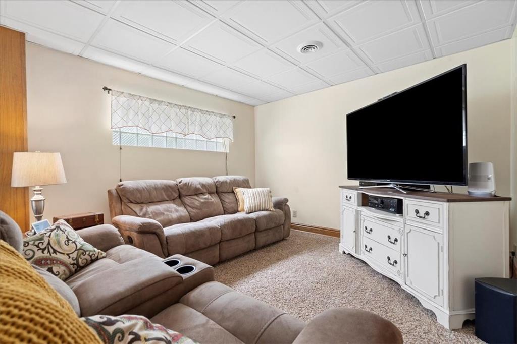 284 McKee Road Washington, PA 15301 - Photo 22 of 35 a living room with furniture and a flat screen tv