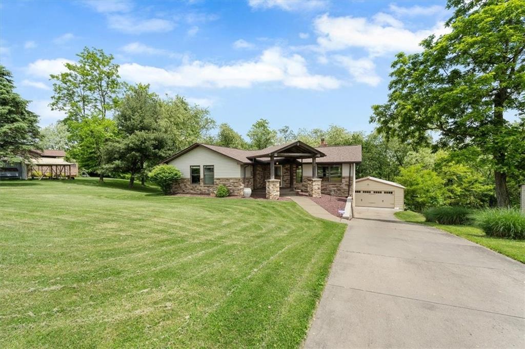 284 McKee Road Washington, PA 15301 - Photo 3 of 35 a front view of a house with garden