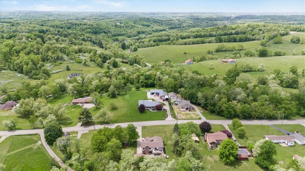 284 McKee Road Washington, PA 15301 - Photo 34 of 35 an aerial view of green landscape with trees houses and mountain view