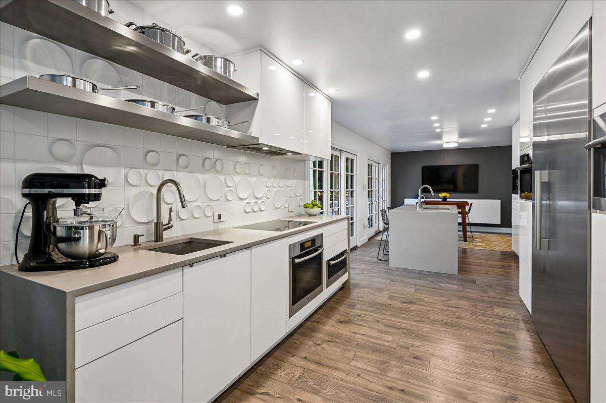 322 Eagle Hill Road Pasadena, MD 21122 - Photo 14 of 70 Chef's Kitchen with Suite of Miele SS Appliances